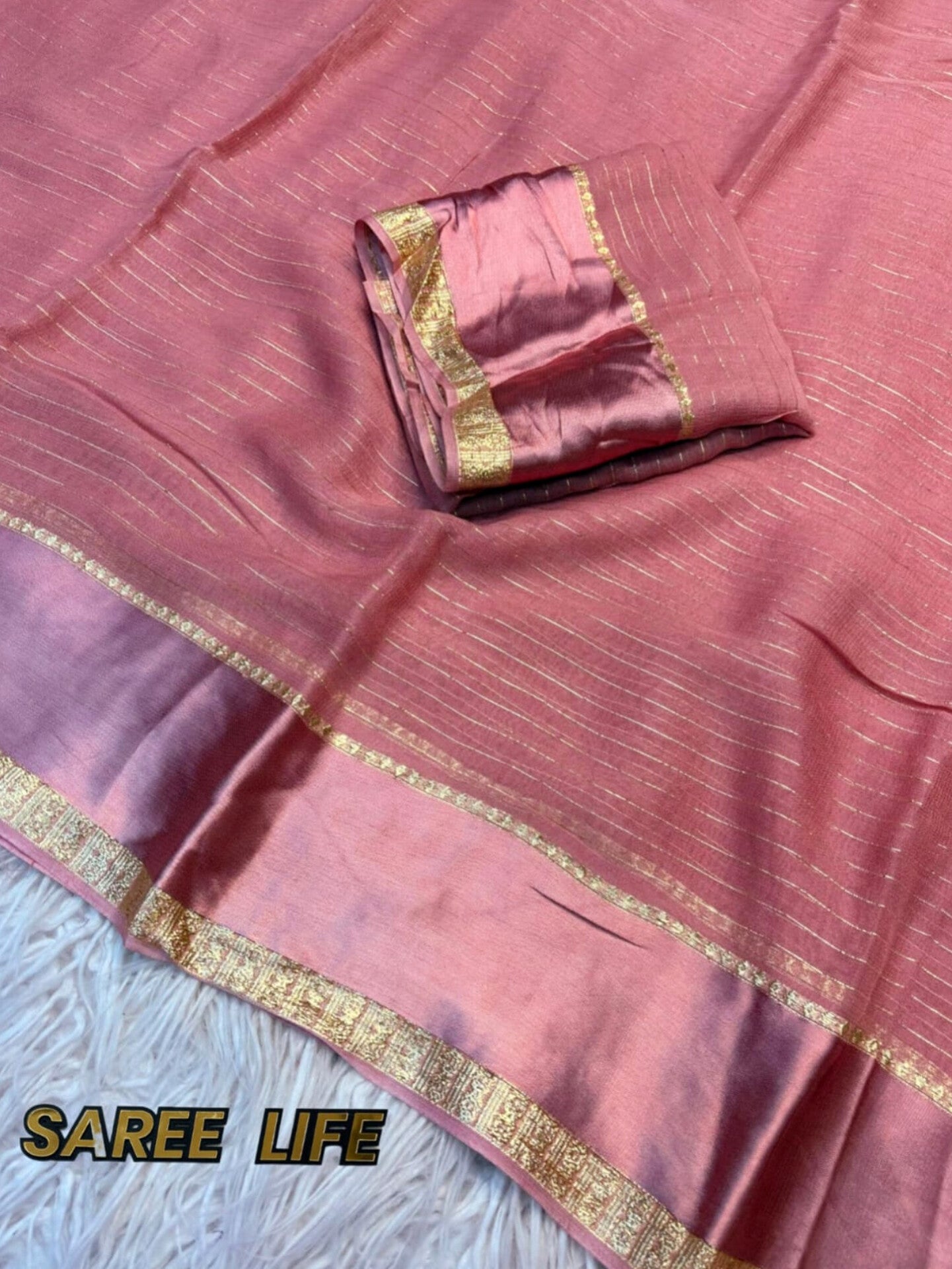 V997 Peach pink geogrette saree