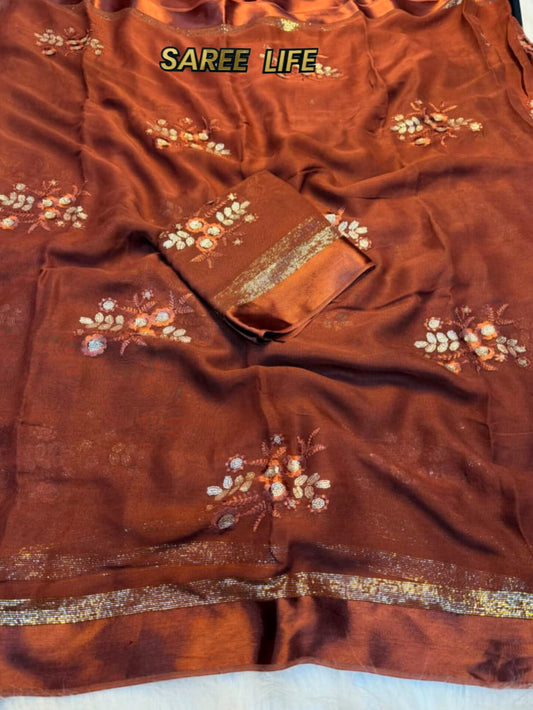 T993 Unique Rust color geogrette saree with blouse